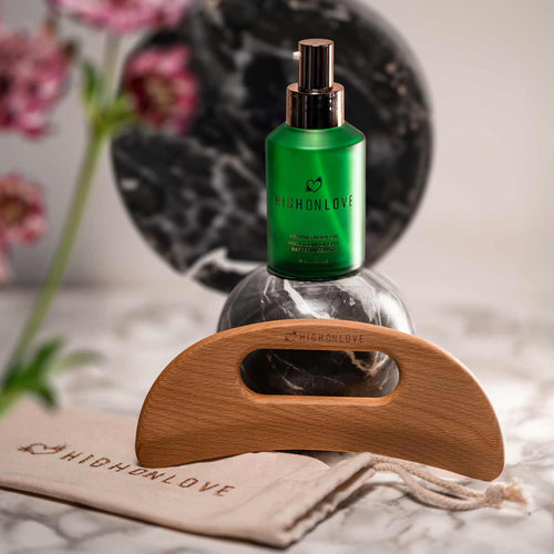 B==Firming body oil and gua sha tool